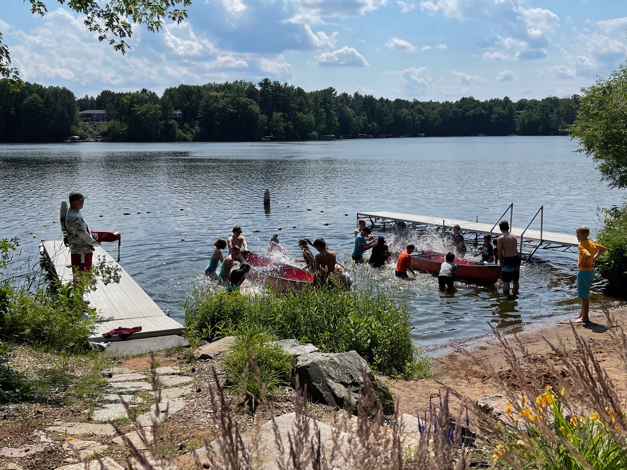 Kids kayaking and canoeing at camp